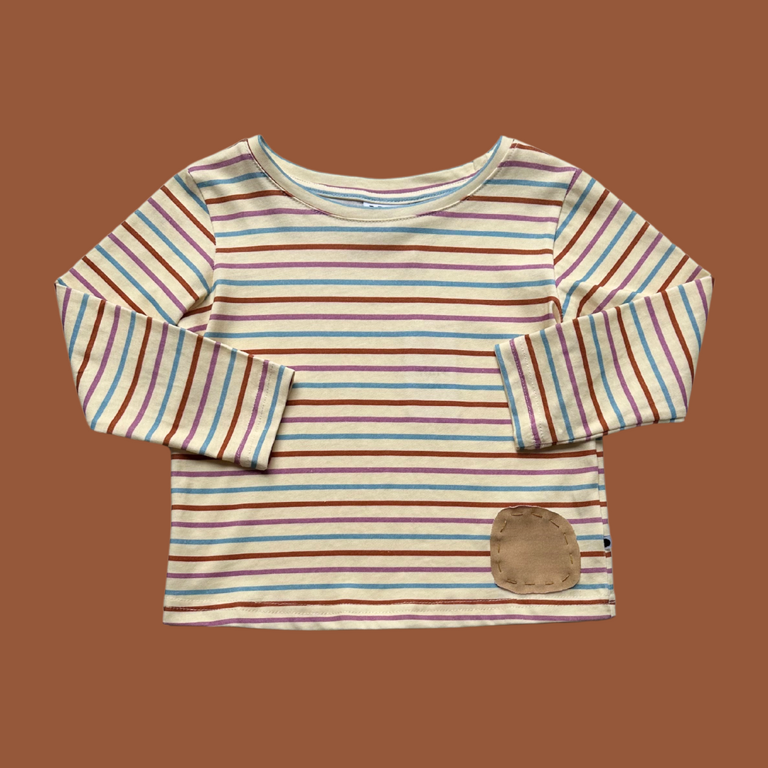 More The Label organic cotton children's Striped long sleeve tee flat lay image showing front.